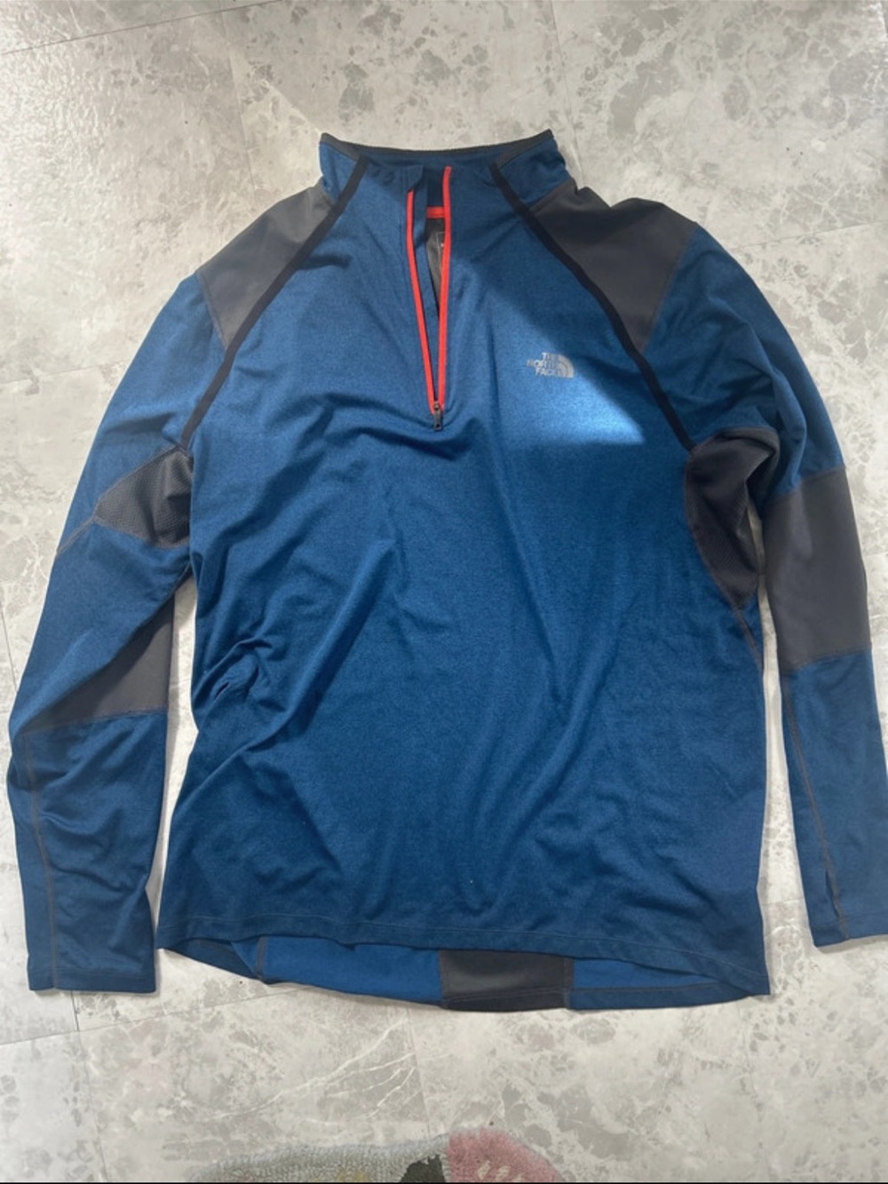 The North Face Blue Men’s Half-Zip Performance Jacket with Red Zip